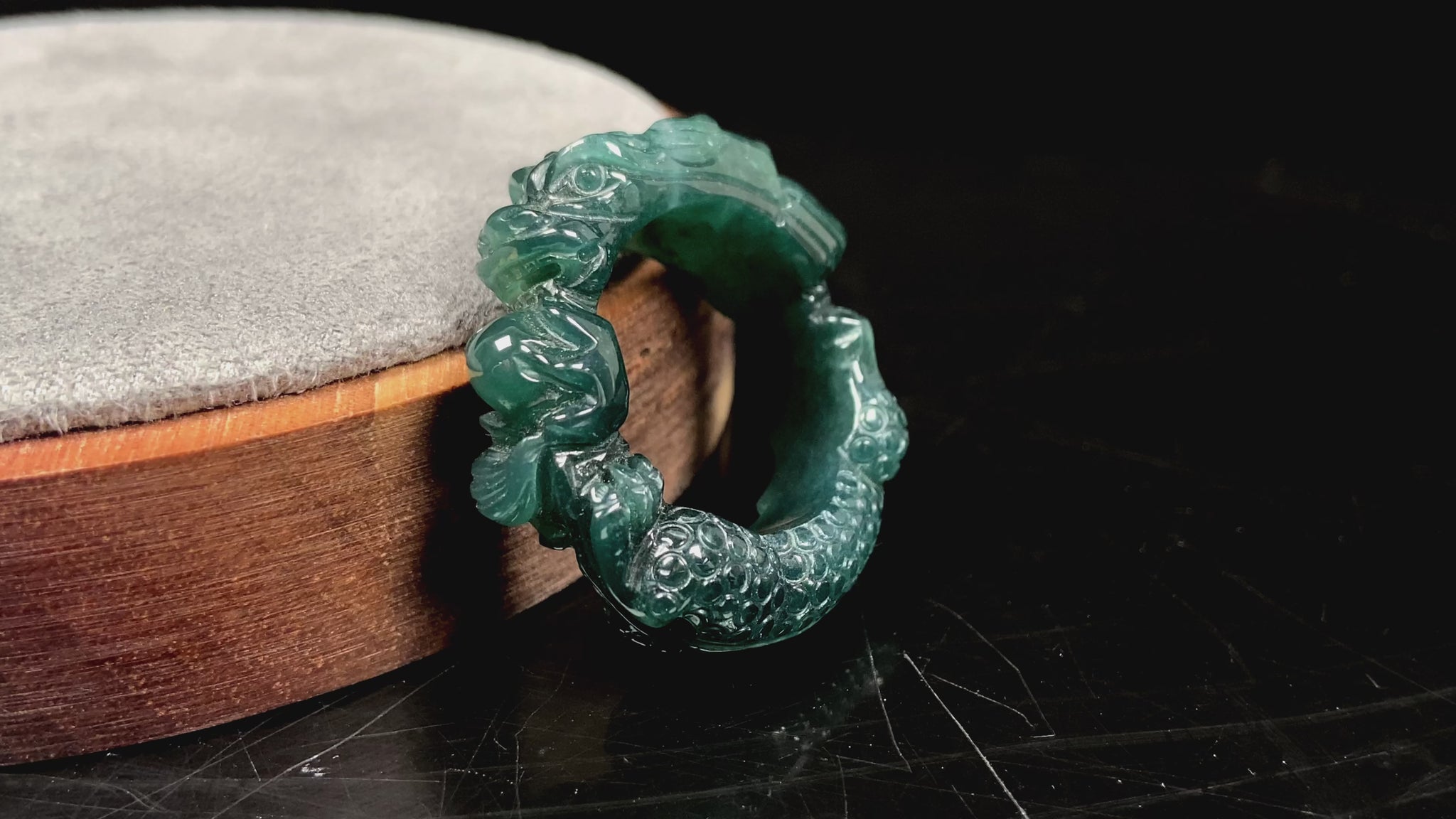 A rich teal dragon jadeite ring.