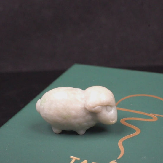 A soft ivory white sheep loose jadeite.