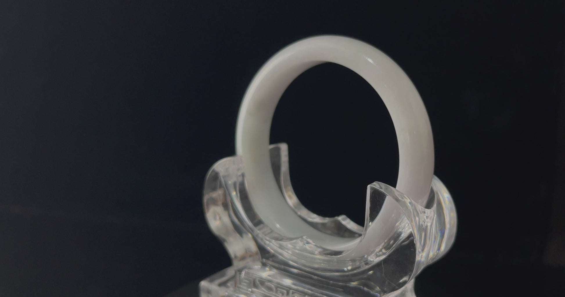 A cloudy milk white jadeite bangle.