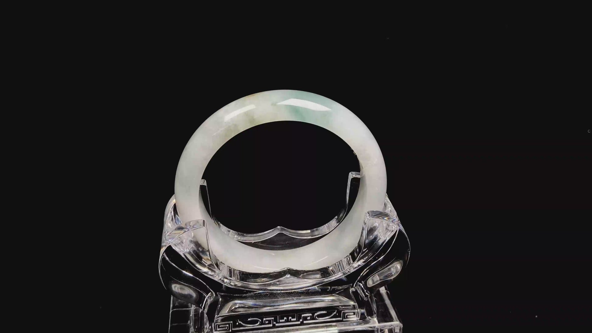 A pale mist azure jadeite bangle.