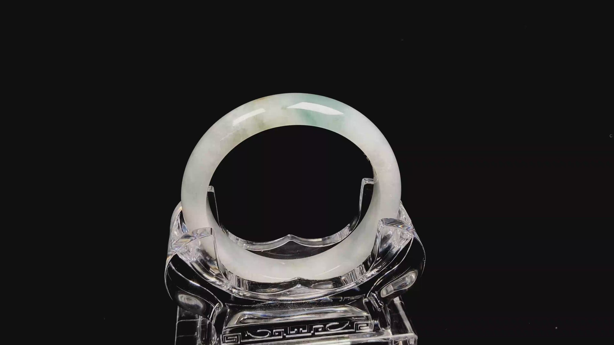 A pale mist azure jadeite bangle.