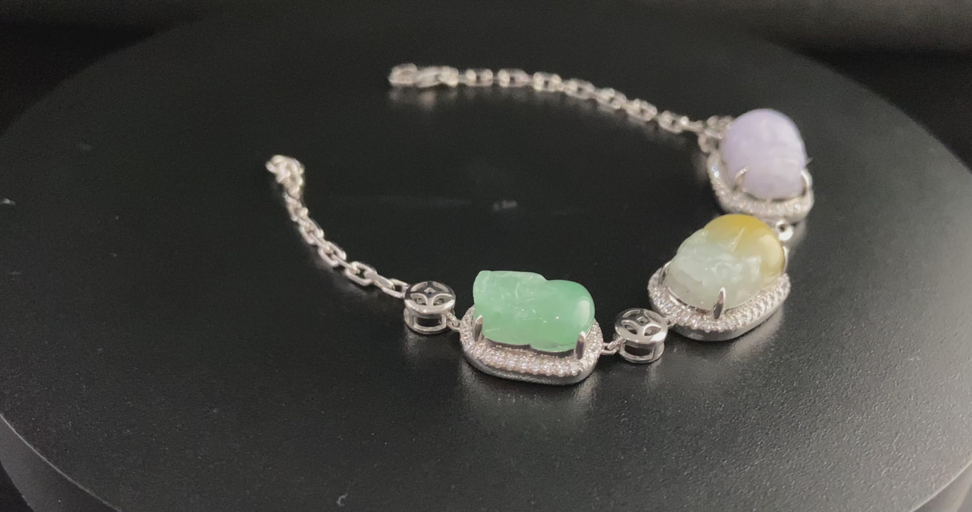 A rainbow Pixiu fortune jadeite bracelet.