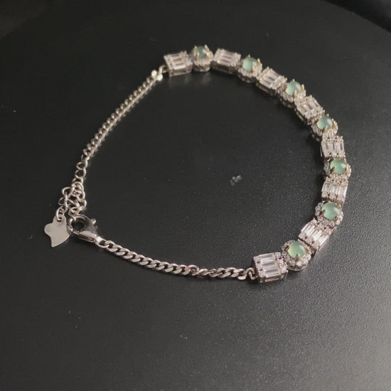 A aqua tidal baguette jadeite  bracelet.