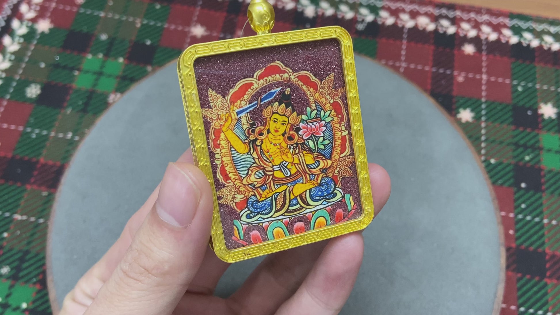 Golden Gawu box with a Manjushri Thangka inside.