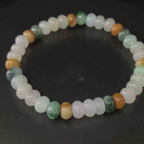 A misty seasonal tones jadeite beads bracelet.