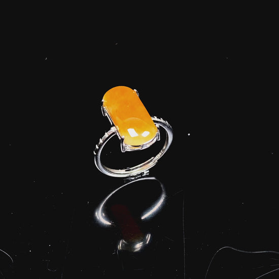 A butterscotch glow saddle jadeite ring.