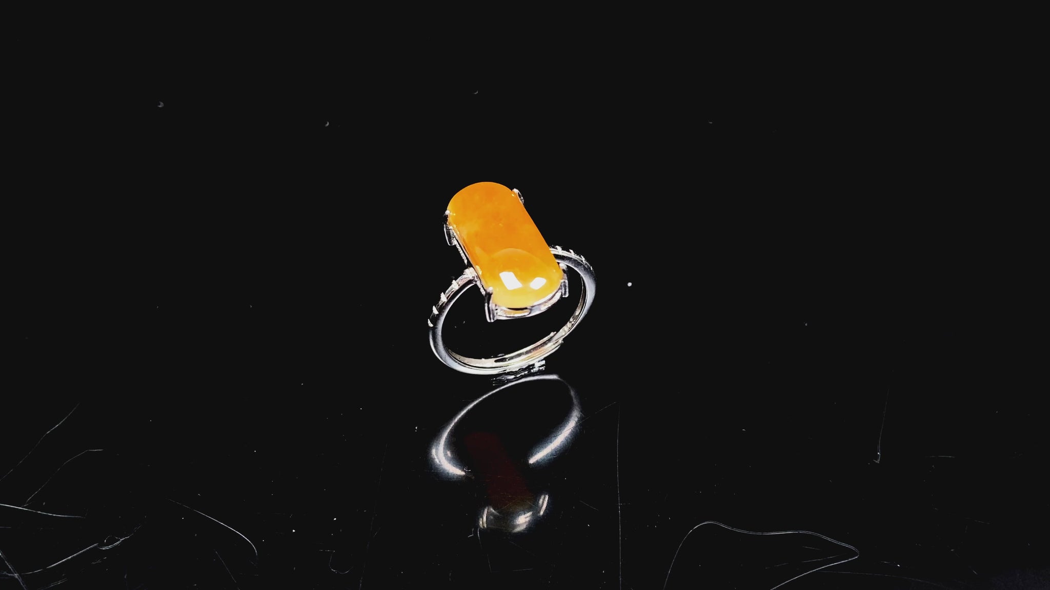 A butterscotch glow saddle jadeite ring.