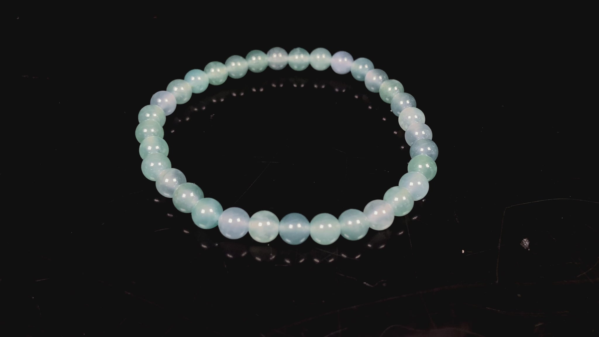 A icy blue repose jadeite beads bracelet.