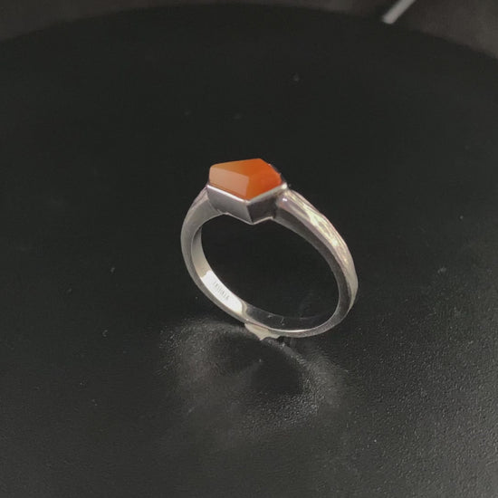 A sunset orange gradient jadeite ring.