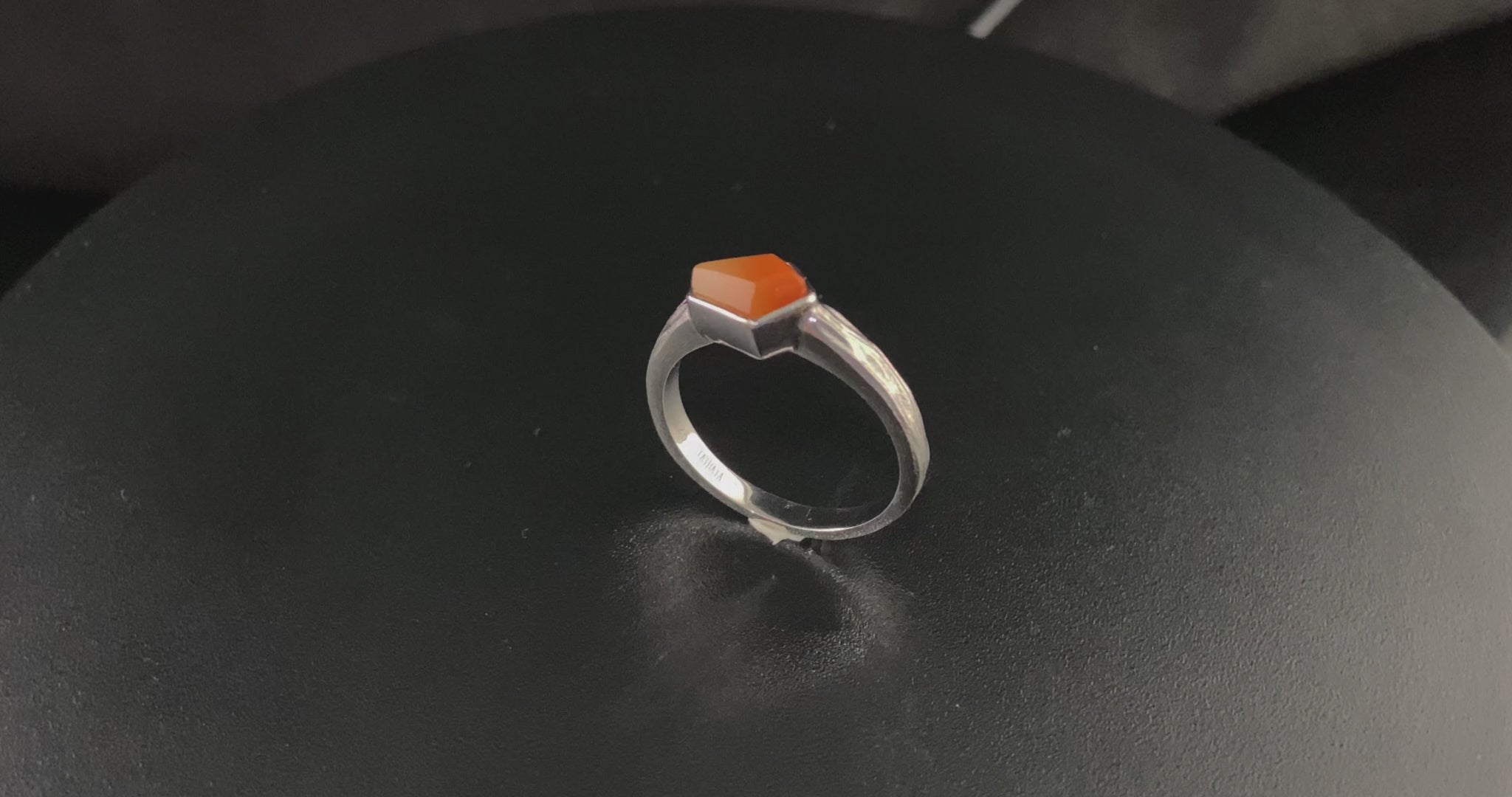 A sunset orange gradient jadeite ring.