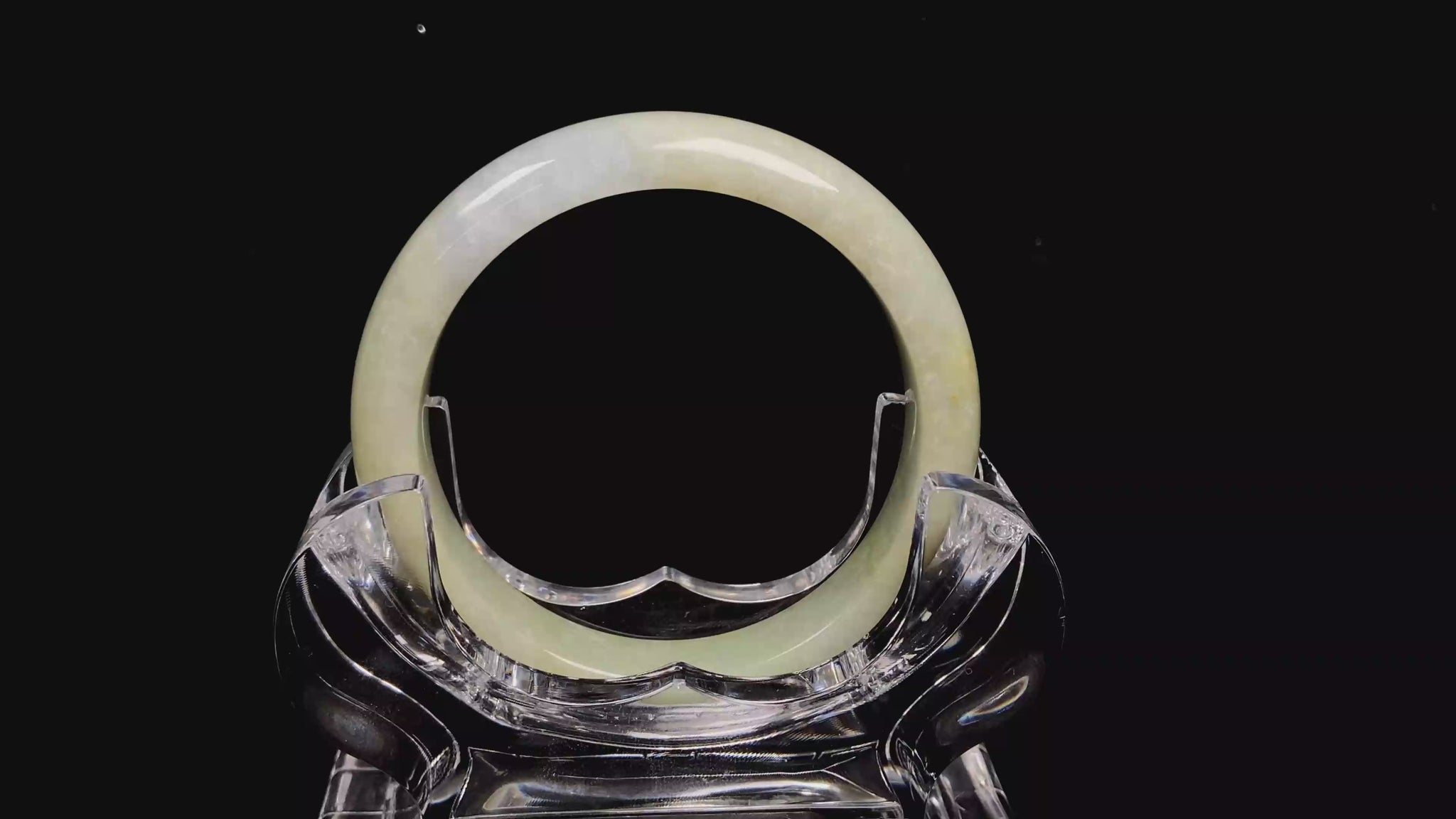 A golden glow spill jadeite bangle.