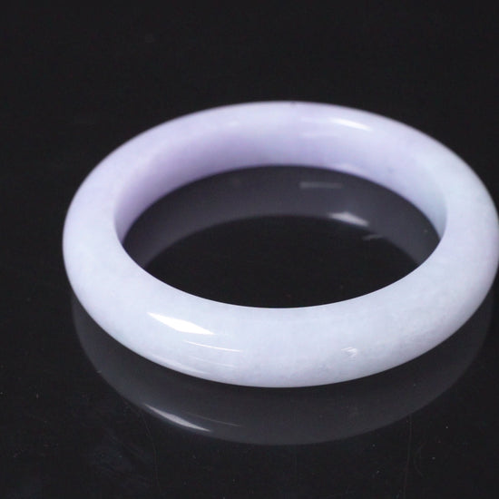 A soft lavender white bangle.