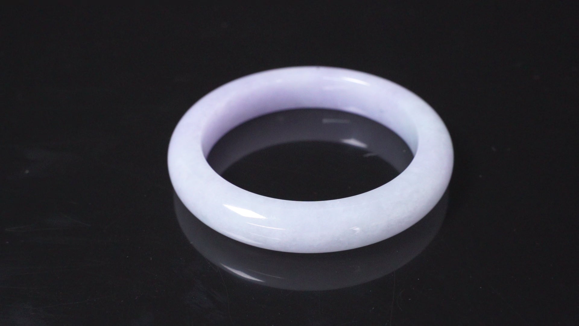 A soft lavender white bangle.