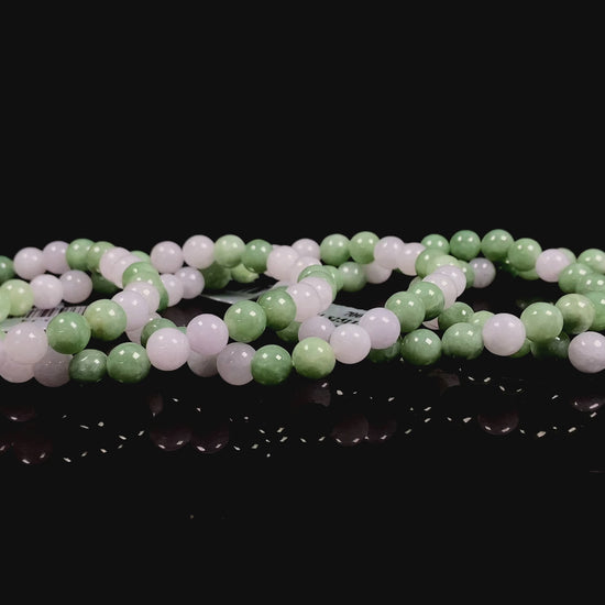 A verdant white peace jadeite beads bracelet group.