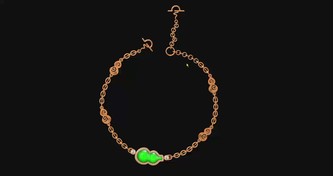 Video of a gold chain bracelet with auspicious cloud engraved gourds,circular links, and a "tathata" logo clasp. The centerpiece is a green calabash set with diamonds and flanked by two larger stones.