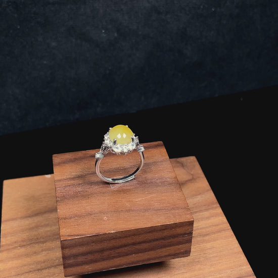 A ambered primrose gleam jadeite ring.