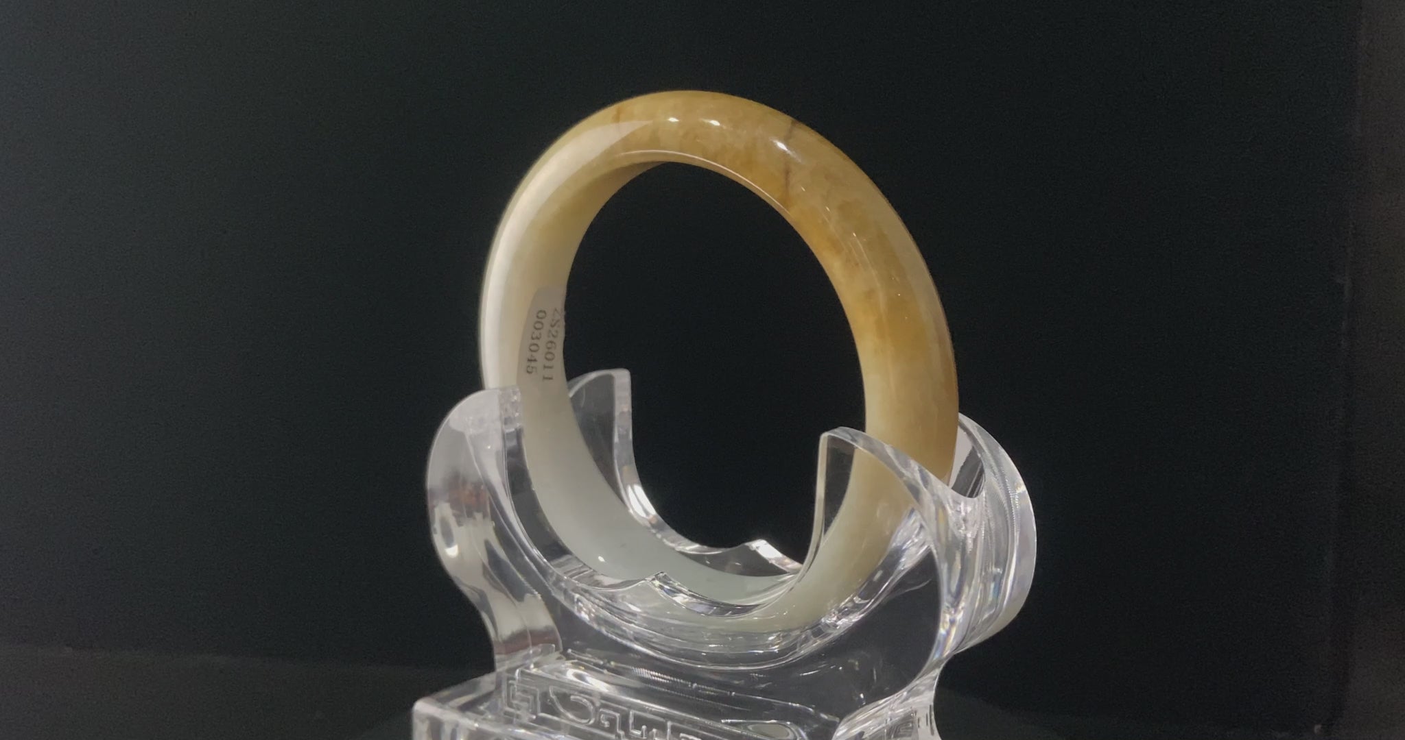 A sundrop amber glow jadeite bangle.