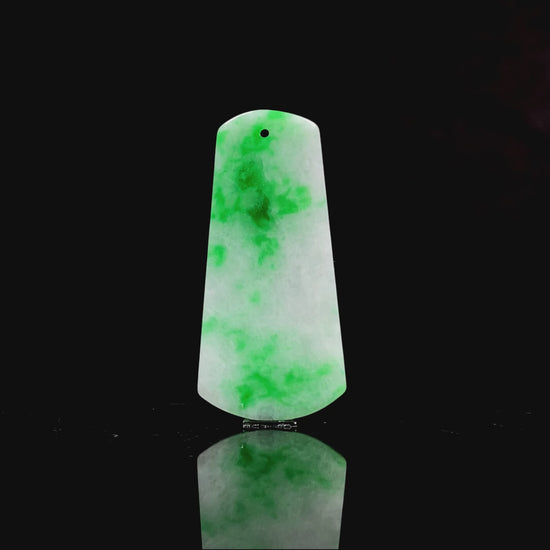 A creamy white Yang Green Wu Shi Pai  loose jadeite.