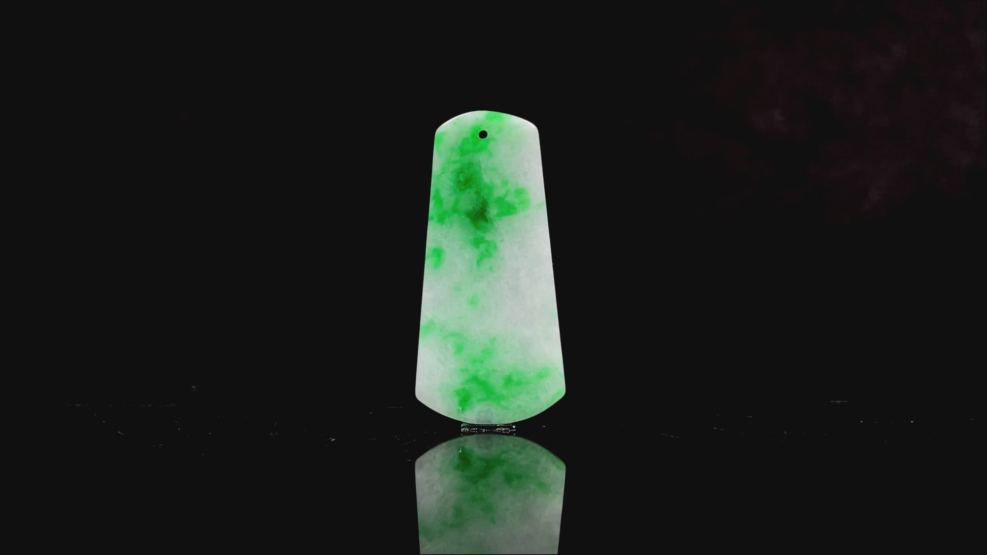 A creamy white Yang Green Wu Shi Pai  loose jadeite.