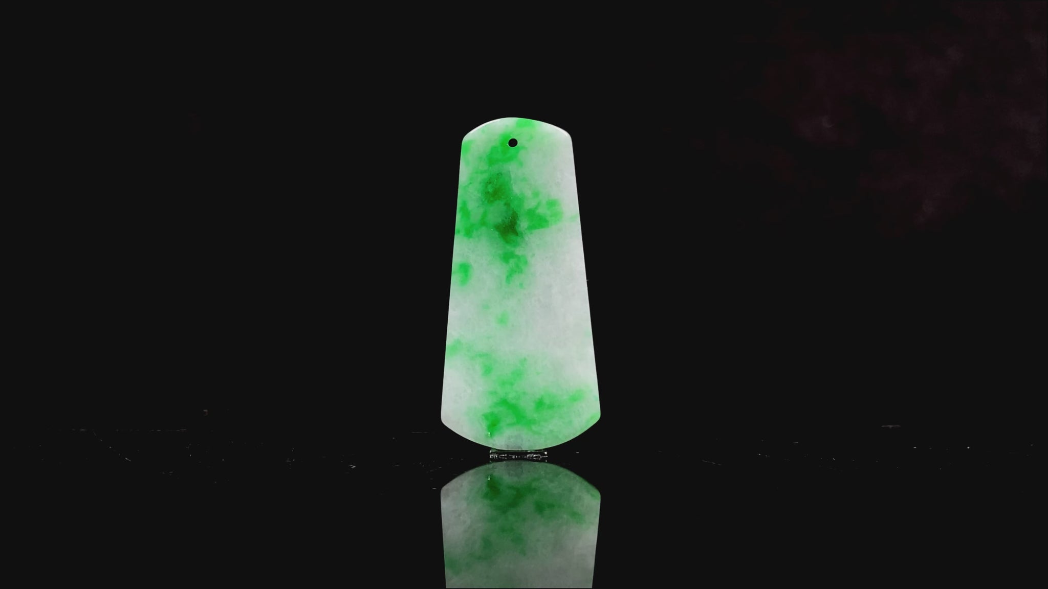 A creamy white Yang Green Wu Shi Pai  loose jadeite.