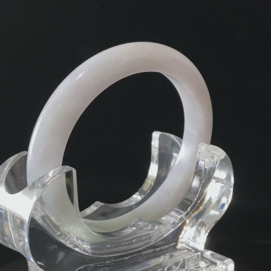 A coudy green mist jadeite bangle.