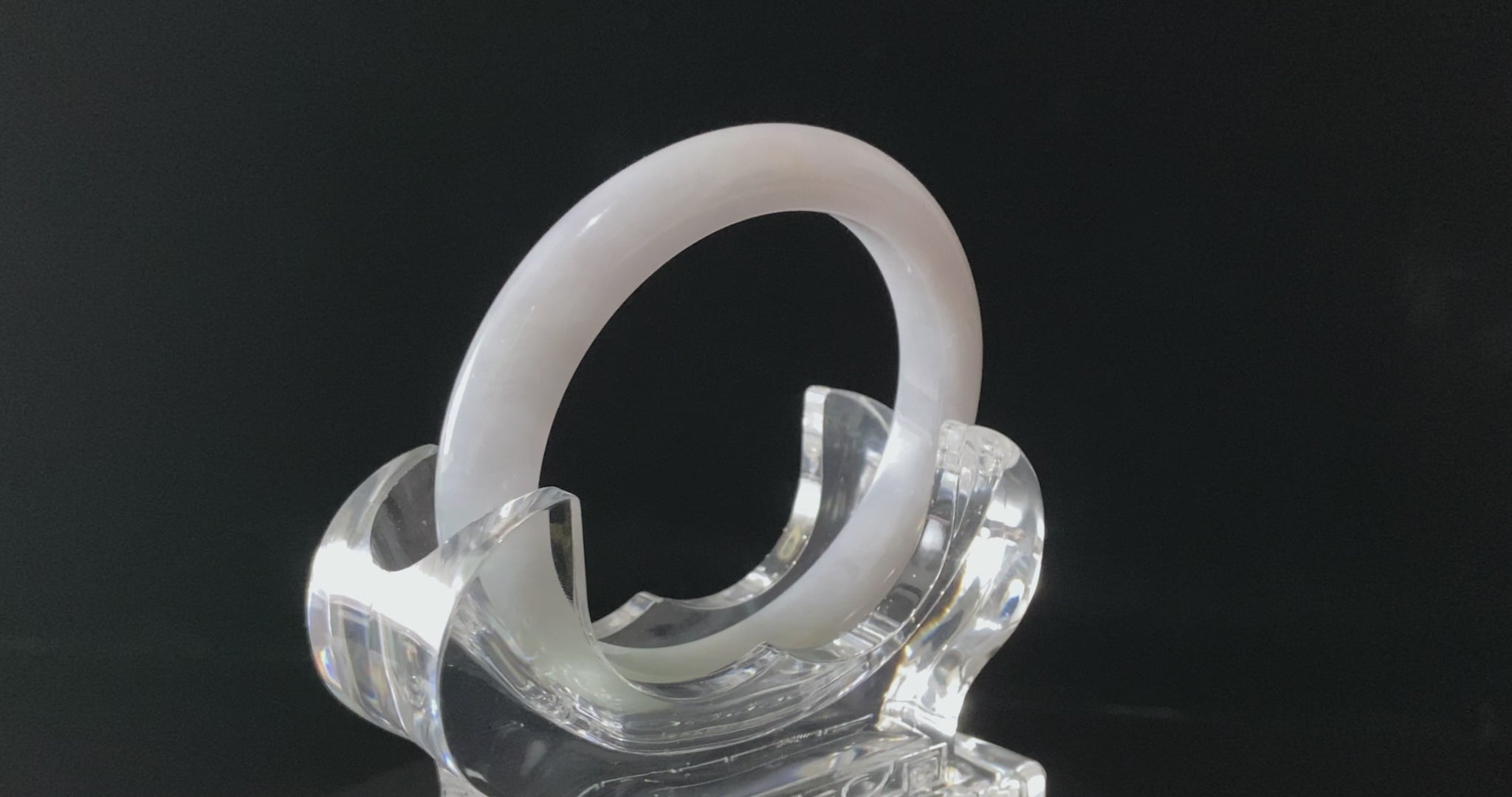 A coudy green mist jadeite bangle.