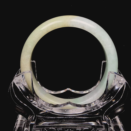 Golden shimmers sprinkling lightly jadeite bangle.