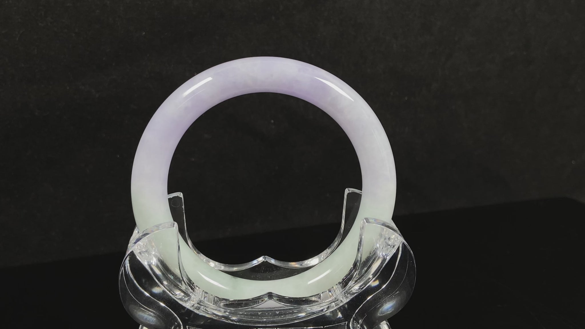 A half lavender half pale green jadeite bangle.