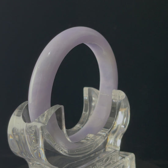 A lilac cloud veil jadeite bangle.
