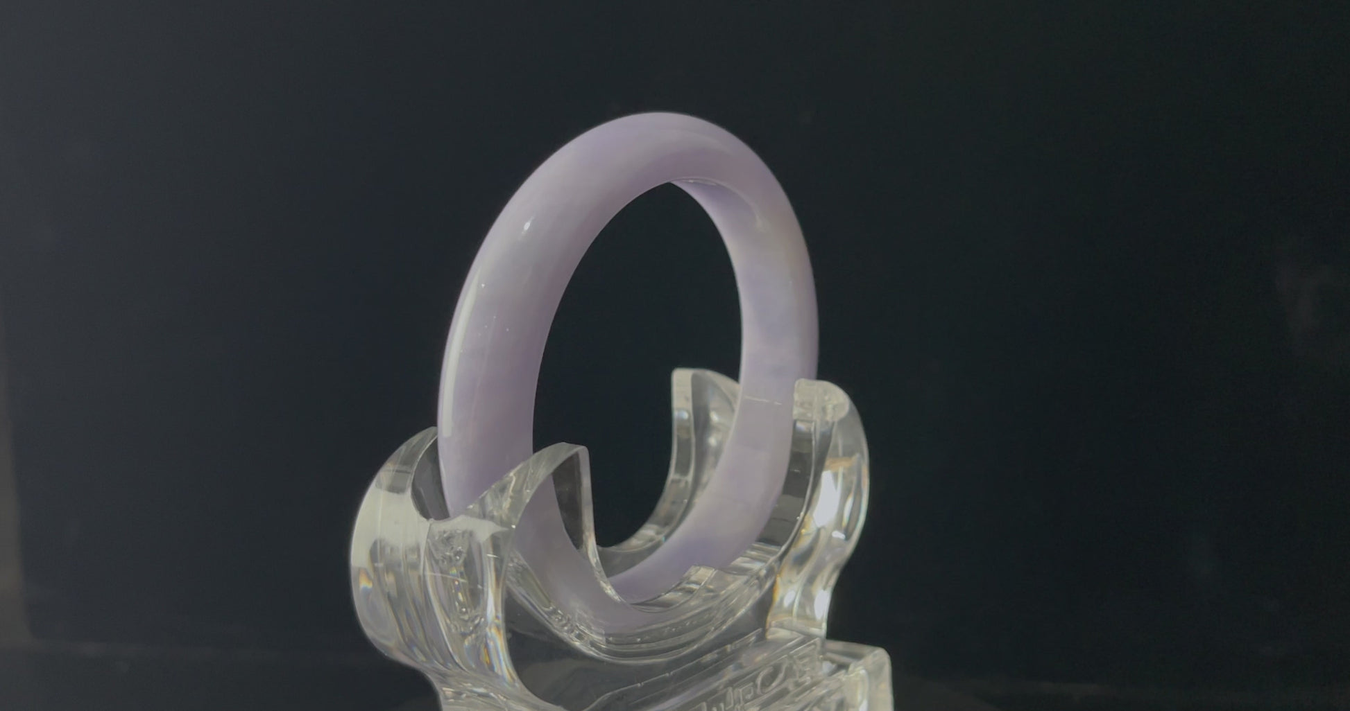 A lilac cloud veil jadeite bangle.