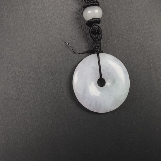 A white green Ping An Kou loose jadeite.