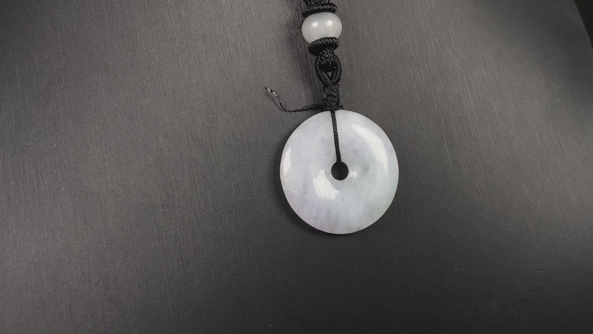 A white green Ping An Kou loose jadeite.