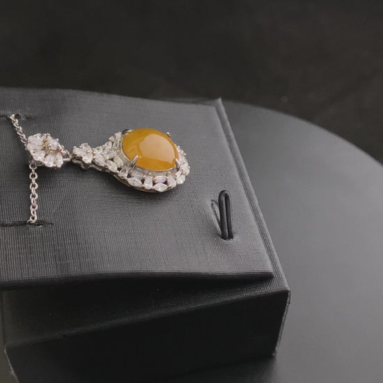 A sunset warm gold sparkle jadeite pendant.
