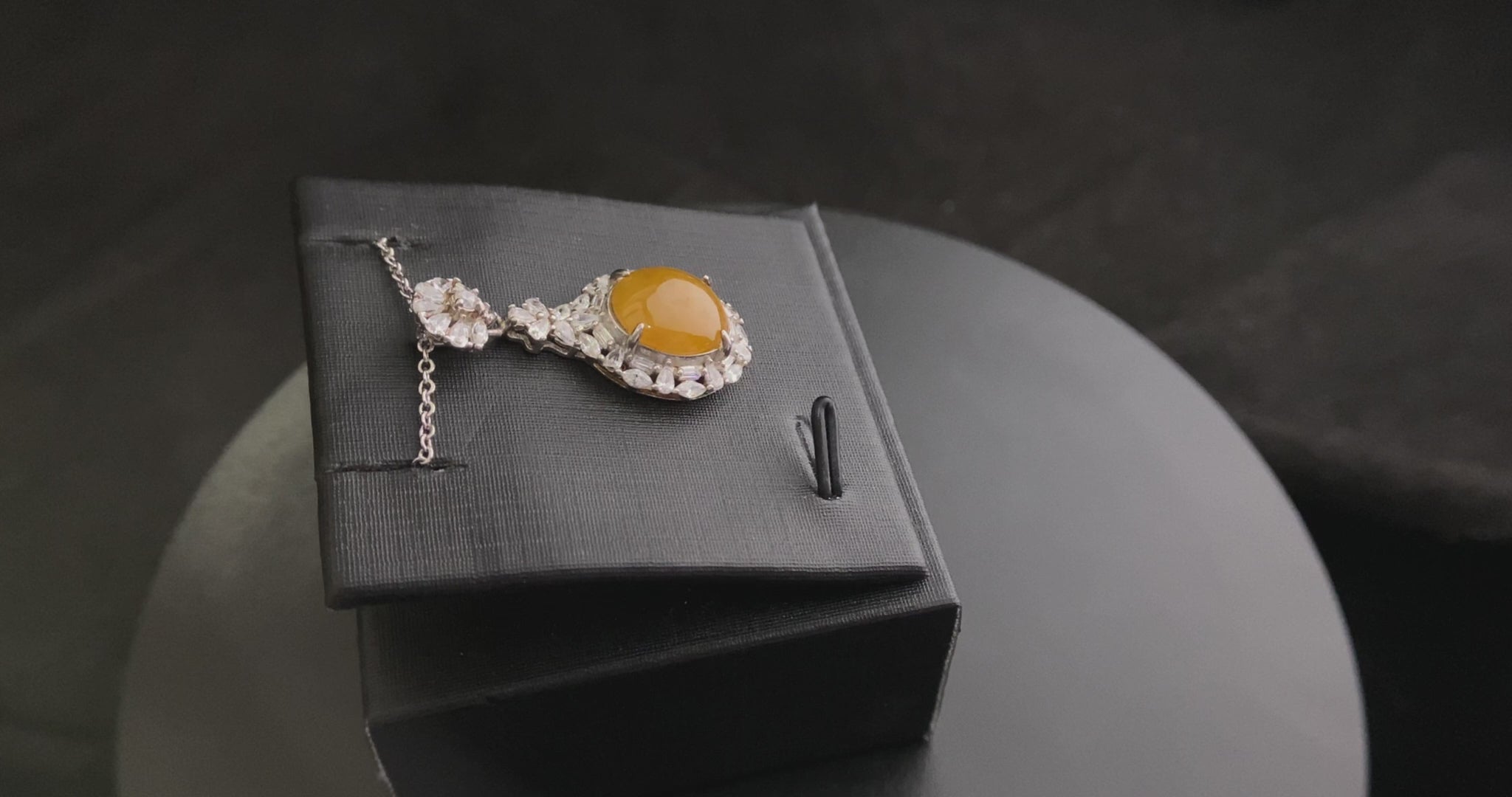 A sunset warm gold sparkle jadeite pendant.