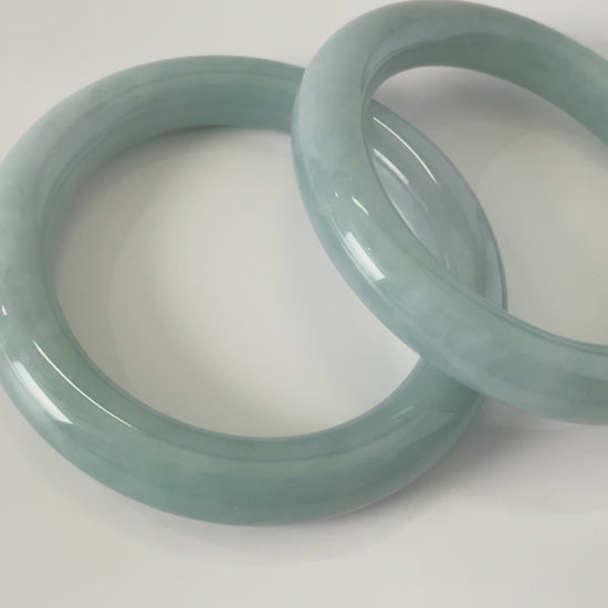 A heavenly blue mist jadeite bangle.