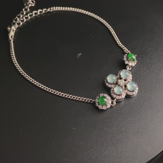 A sky green clover jadeite bracelet.