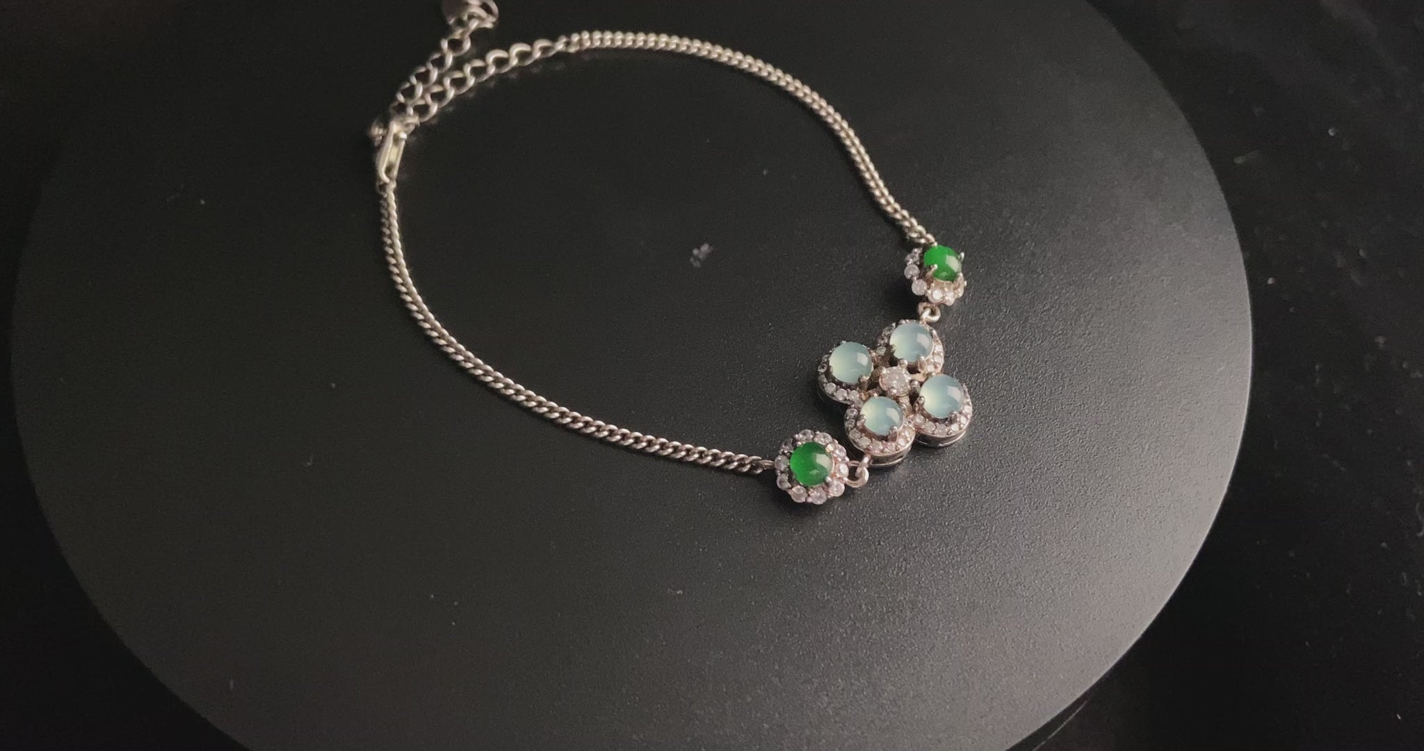 A sky green clover jadeite bracelet.