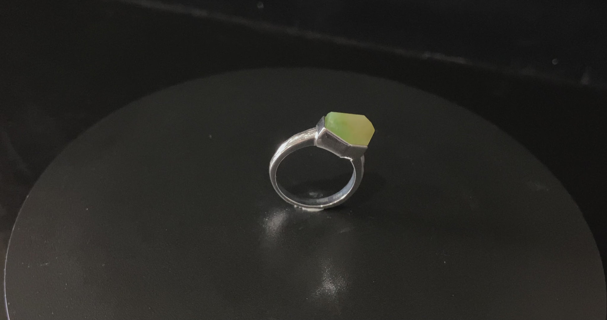 A honey lime gradient jadeite ring.
