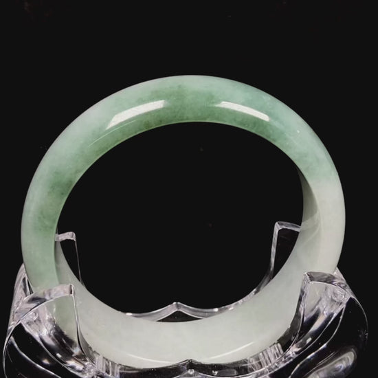 A fresh green with cloud white jadeite bangle.