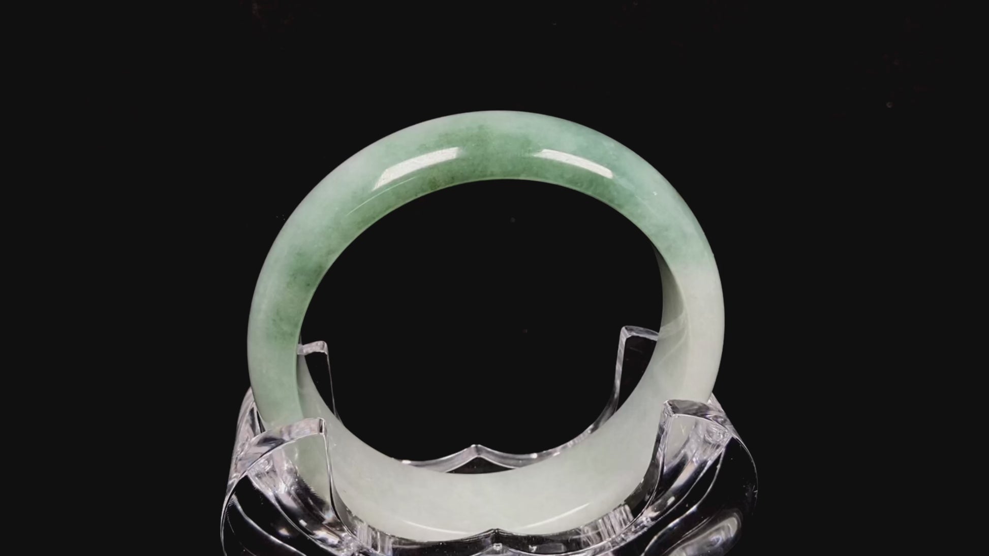 A fresh green with cloud white jadeite bangle.