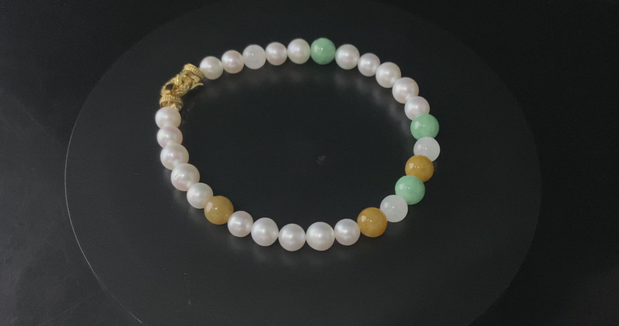 A sunlit mint pearl jadeite beads bracelet.