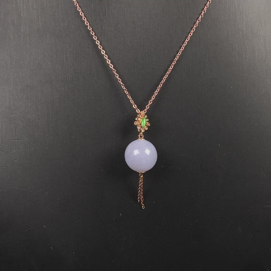 A lavender moon orb jadeite pendant.
