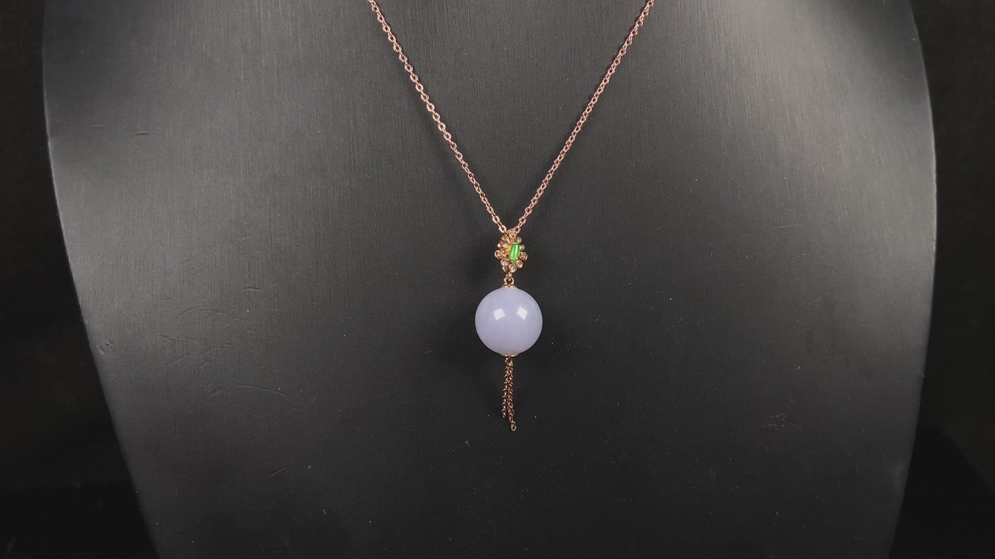A lavender moon orb jadeite pendant.