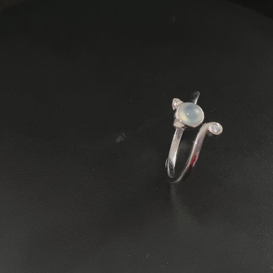 A moonlight feline jadeite ring.