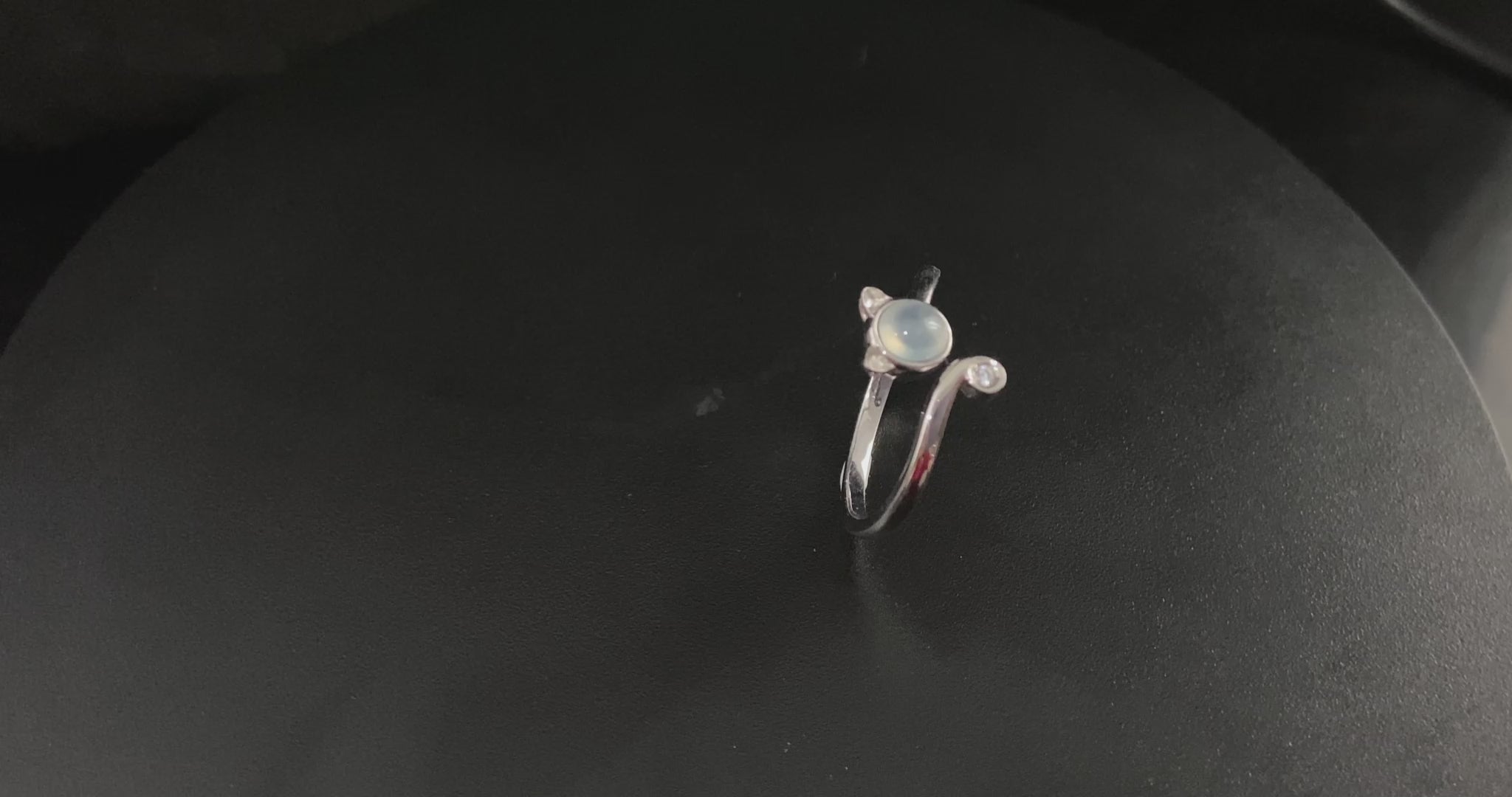 A moonlight feline jadeite ring.