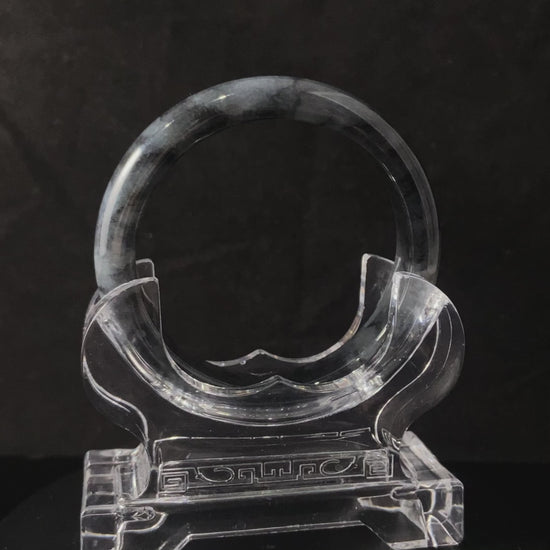 A grey cloud veil jadeite bangle.
