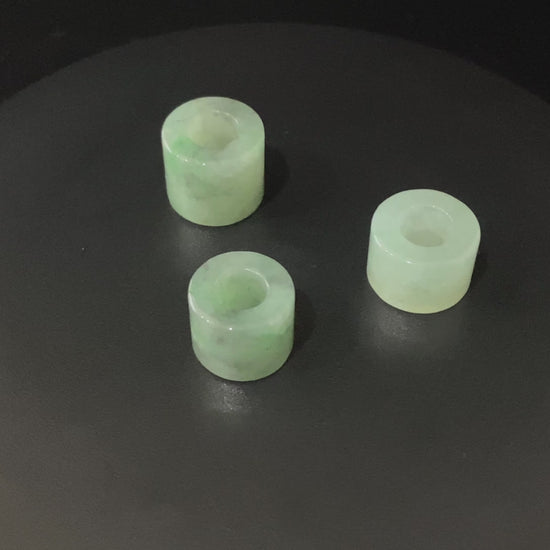 A dewy aqua barrel loose jadeite.