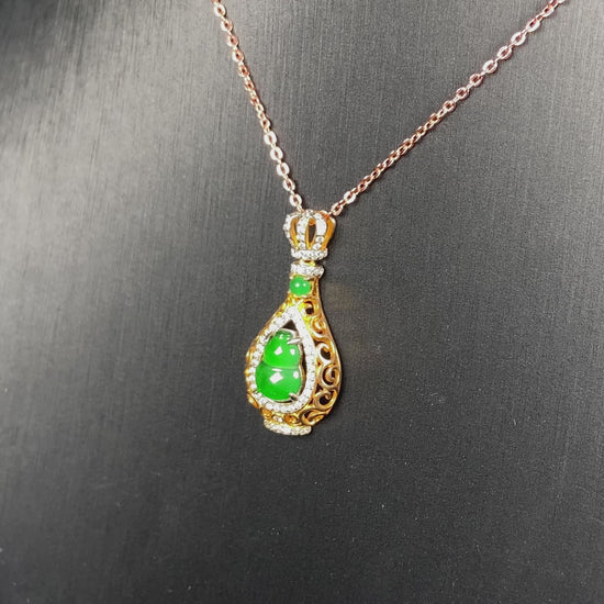 A rich green fortune gourd jadeite pendant.