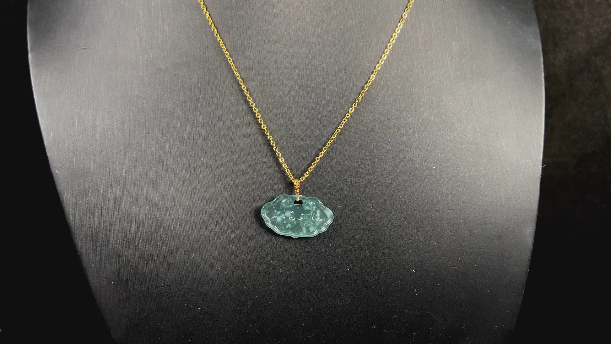 A floating flower icy blue jadeite pendant.