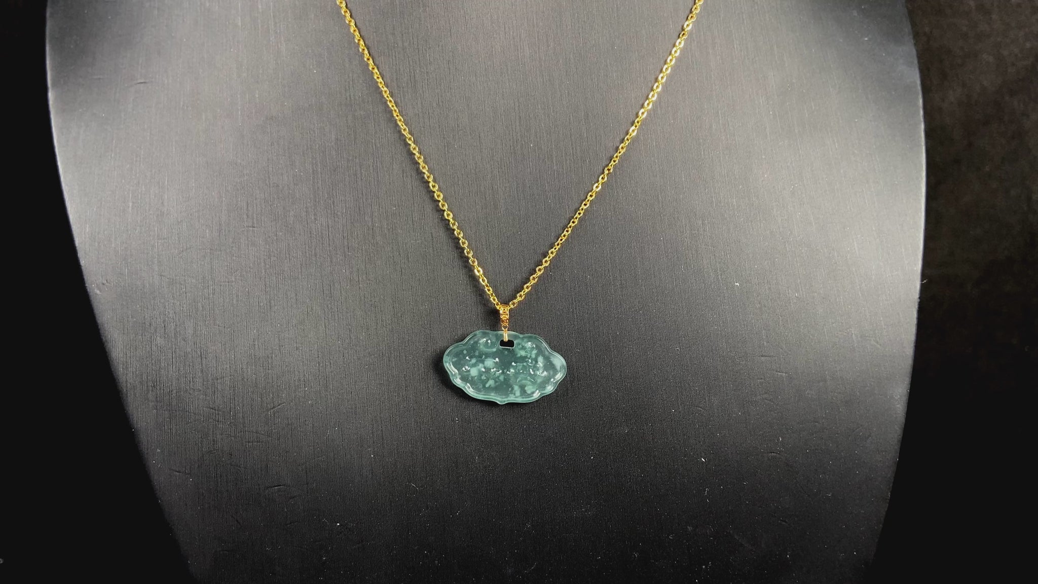 A floating flower icy blue jadeite pendant.